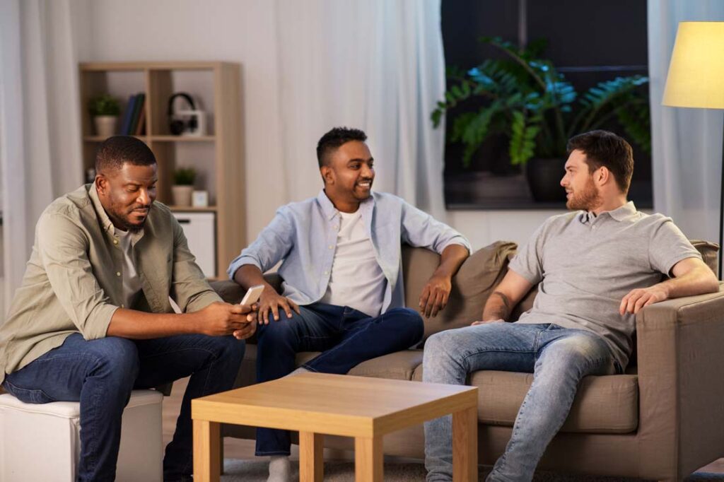 man texting during conversation