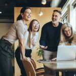 happy team of people working